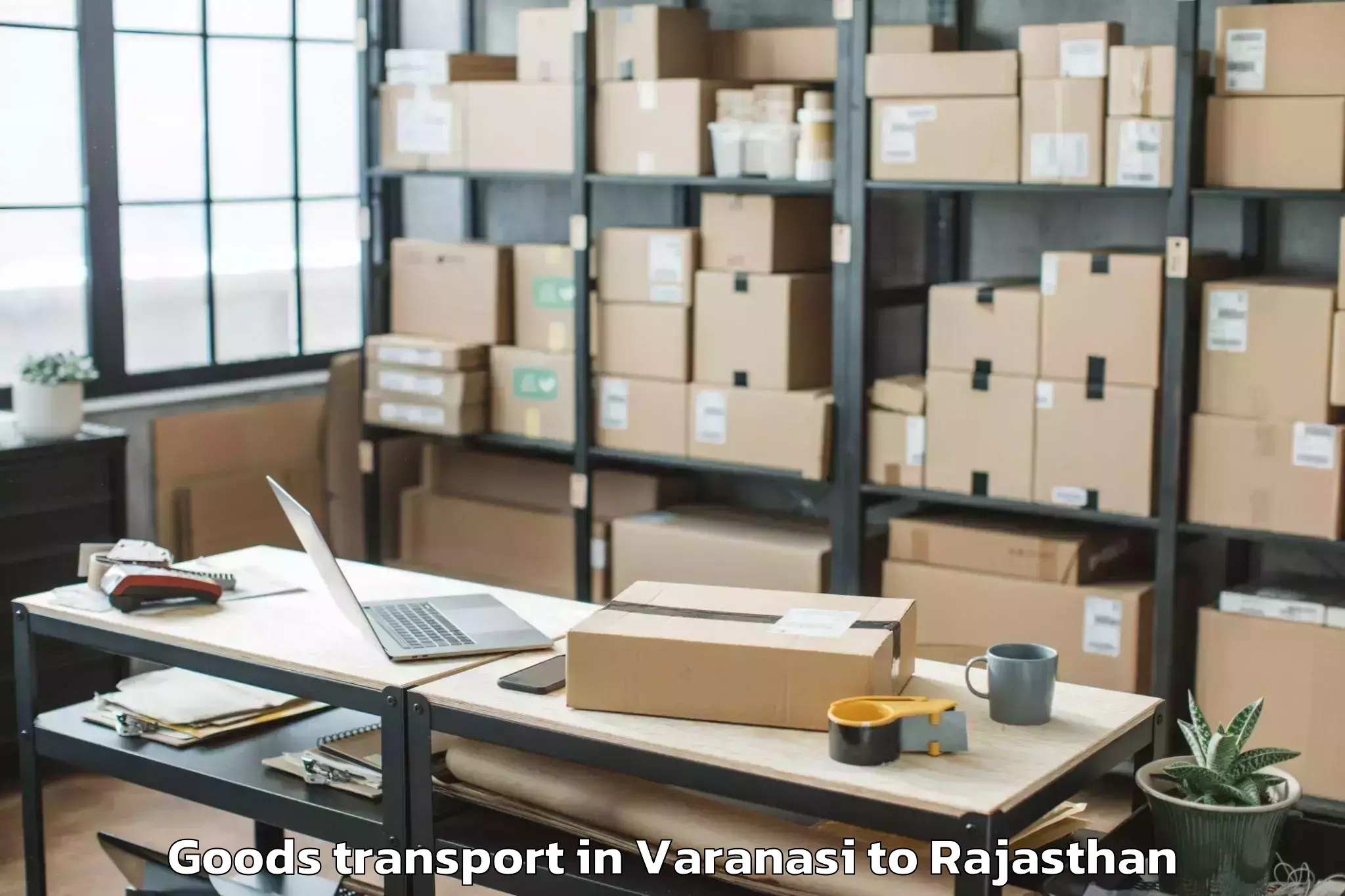 Top Varanasi to Opjs University Churu Goods Transport Available